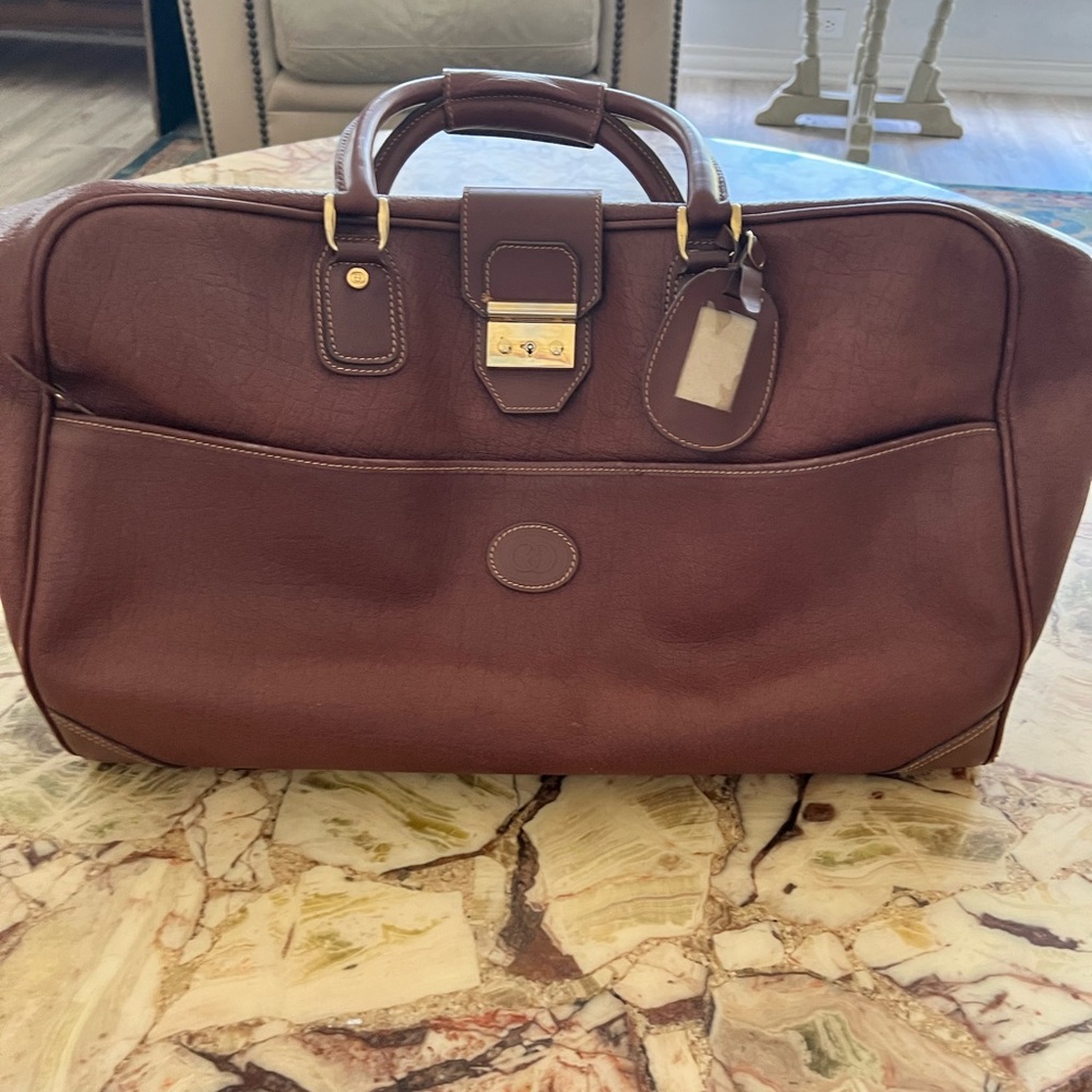 Gucci leather large carry on. Excellent condition.